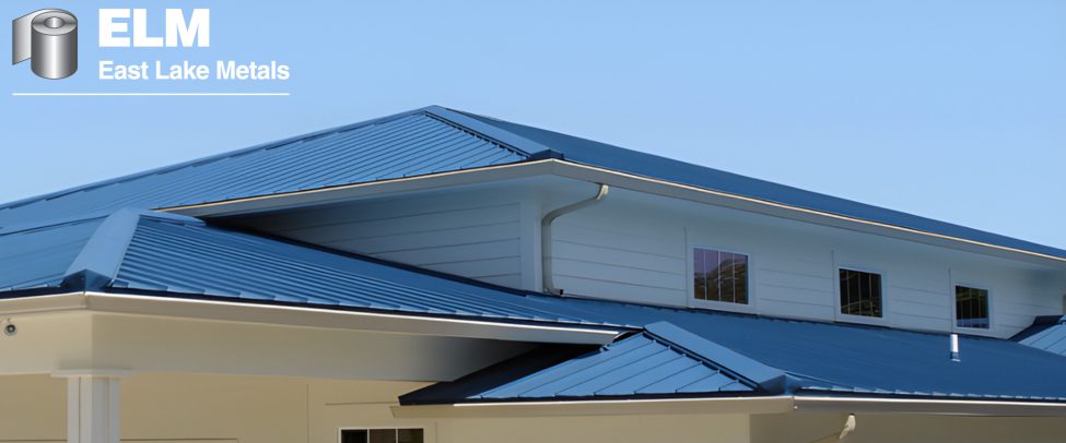 A close-up of a blue standing seam metal roof featuring PVDF coatings for construction projects provided by East Lake Metals, engineered for superior color retention and weather resistance.
