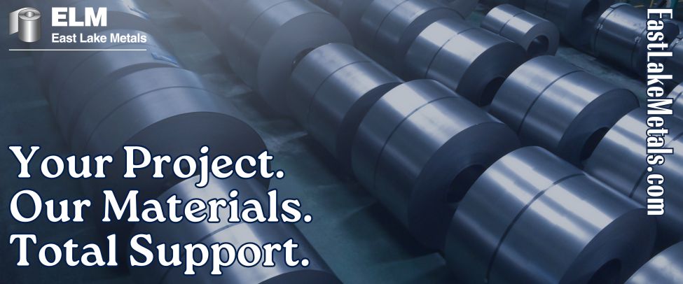 Rows of high-performance metal coils in the East Lake Metals warehouse, representing the total support offered by a trusted metal supplier for construction projects.