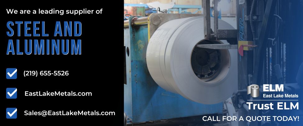 An industrial view of large steel coils being processed, showcasing East Lake Metals as a leading trusted metal supplier for construction projects providing high-quality steel and aluminum.