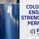 Large coils of vibrant blue and silver architectural metal, illustrating the high-performance prepainted metal color retention standards of East Lake Metals.