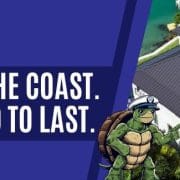 An architectural standing seam roof overview by East Lake Metals, promoting Armored Coast systems that satisfy rigorous coastal construction material standards.